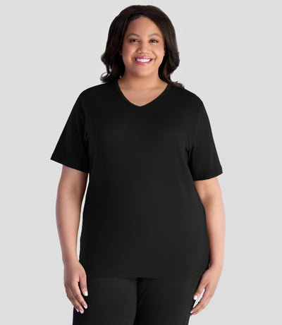 JunoActive model wearing EasyLuxe Classics V-Neck Top  in color black. Model is facing forward with her arms by her side.