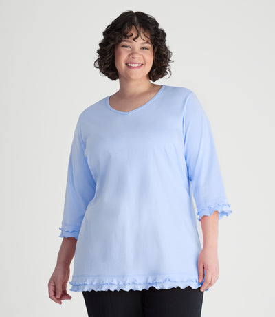 Model, facing front, wearing cotton chic lettuce trim 3-4 sleeve plus size top in color sky blue.
