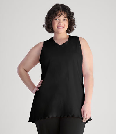 Model, facing front, wearing JunoActive's Cotton Chic Let's Trim Sleeveless plus size top in color black.