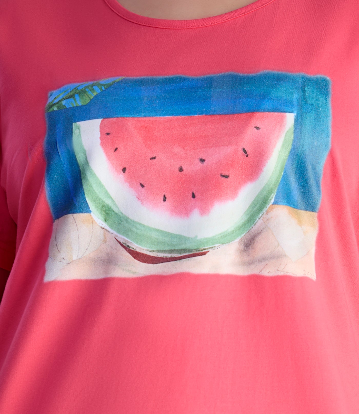 Close up of JunoActive's Designer Graphic scoop neck top with watermelon print on color carnation pink.