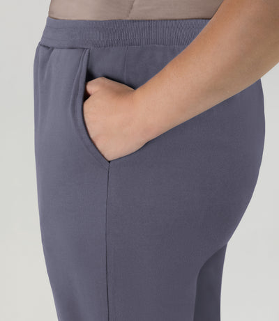 Close up of Plus size model wearing JunoActive's Legacy Cotton Casual Pocketed Jogger in color Misty Grey.