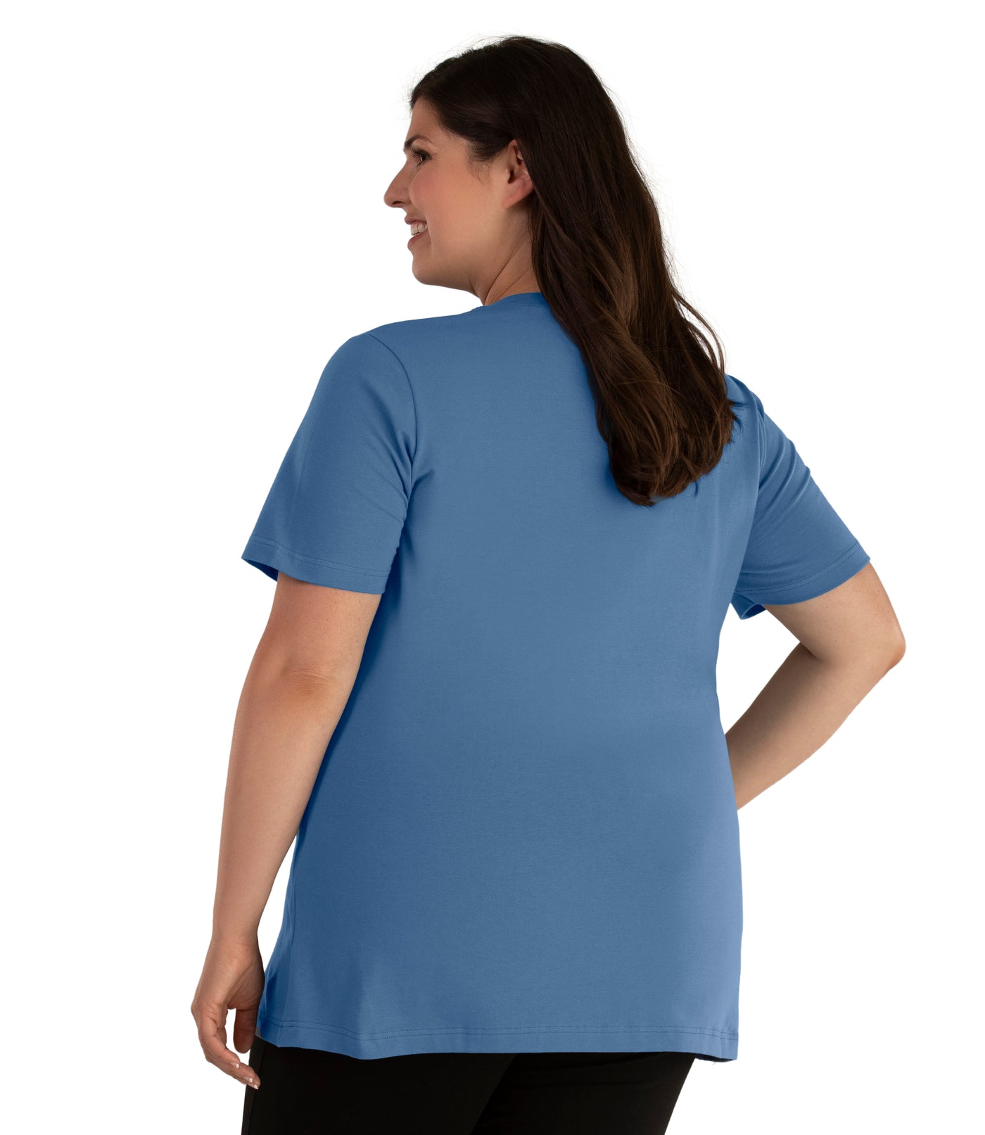 Back of model wearing JunoActive's Designer Graphic V-neck top with in color denim.