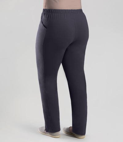 Bottom half of plus sized woman, back view, wearing JunoActive Stretch Naturals Side Pocket Loose Fit Leggings in color oak gray. Bottom hem is at the ankle.