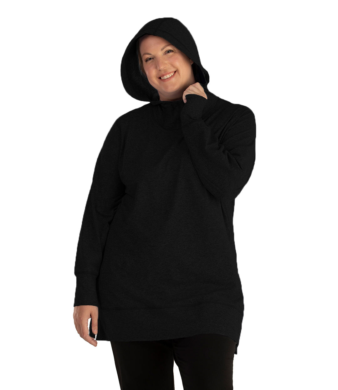 Plus size woman, facing front, wearing JunoActive plus size SoftWik Long Sleeve Hoodie in the color Black. She has the hood up on her head, covering her hair. She is wearing JunoActive Plus Size Leggings in the color Black.
