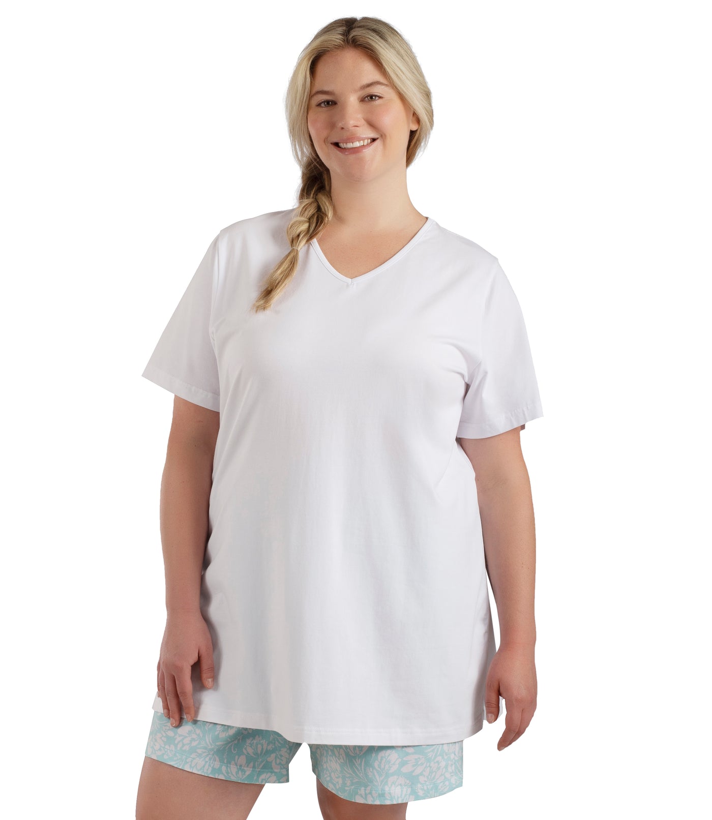 Plus size woman, facing front, wearing JunoBliss V-Neck Short Sleeve Top in color white. Hands down by sides.