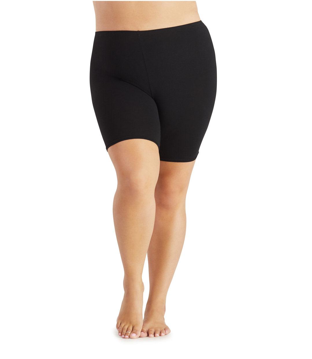 Plus size woman, front view, wearing JunoActive Junowear Cotton Stretch Fitted Boxer. The hemline is a few inches above knee in color black.