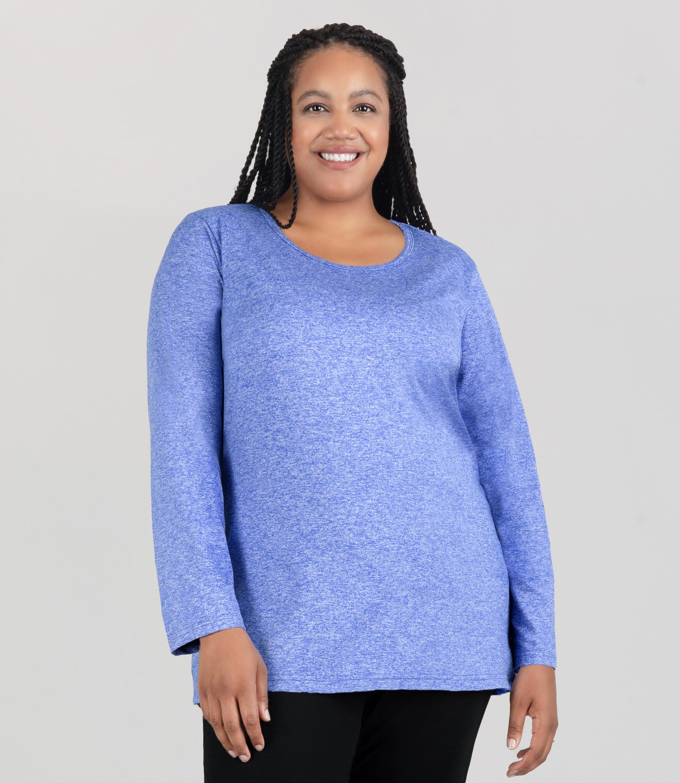 Model, facing front, wearing JunoActive's Softwick Long Sleeve Crew Neck Top in color heather royal.