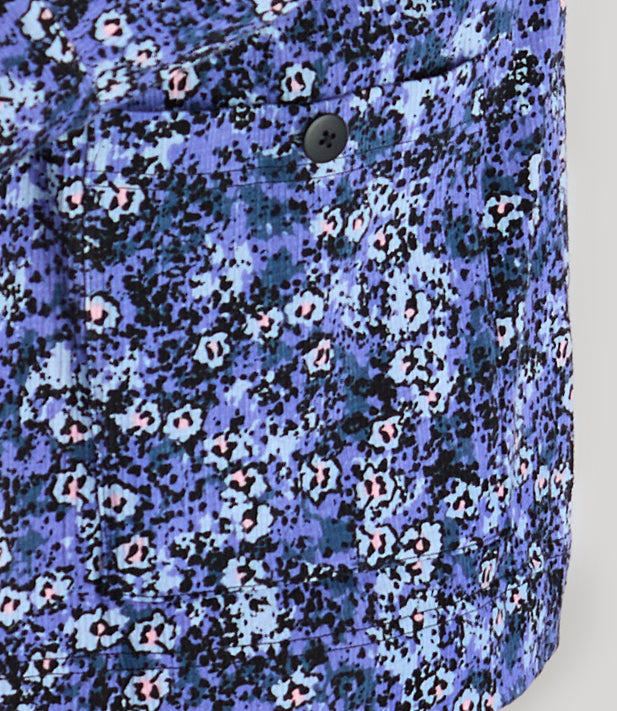 Close up of pocket of JunoActive's plus size EZ Style Cotton Long Sleeve Pocket plus size Jacket in color blue meadow print.