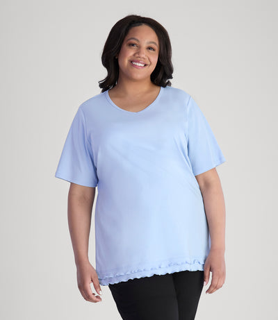 Model, wearing Cotton Chic Lettuce Trim Short Sleeve plus size Top in color sky blue.