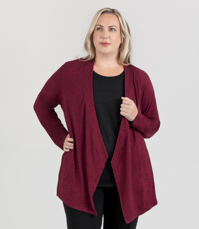 JunoActive Model, facing front, wearing SoftSupreme Cardigan in Heather Cranberry.