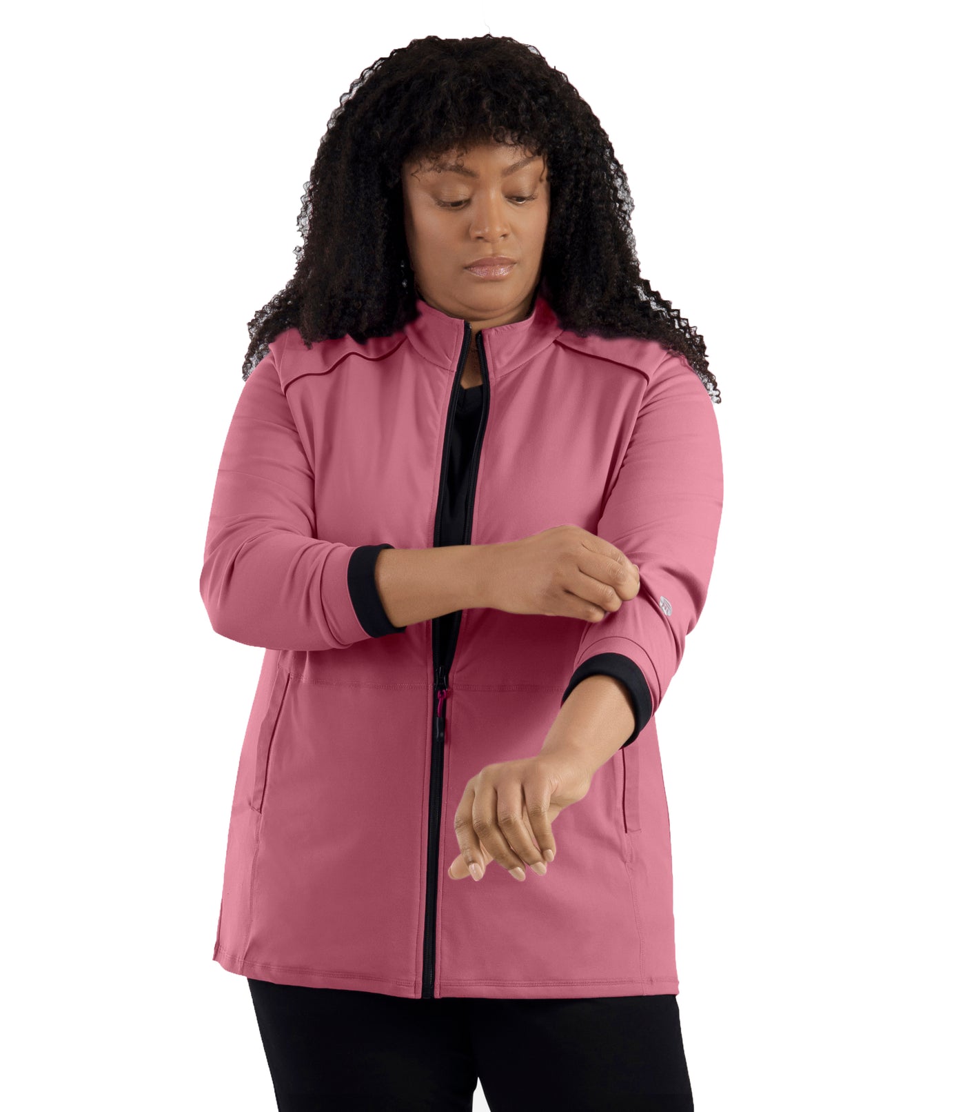 JunoActive's Plus size model wearing JunoStretch Mock Neck Jacket in Warm Mauve with black accents. Model is facing front rolling up sleeves.
