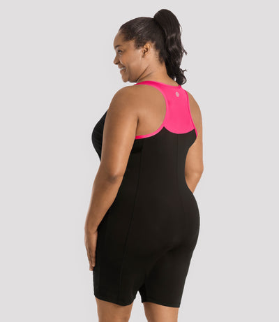 JunoActive Model, facing back, wearing QuikEnergy Racer Back Zip Front Aquatard in color Lotus Pink and Black.