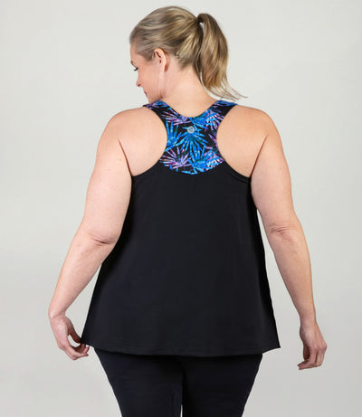 Plus size model, facing back, wearing AquaSport Hanalei Plus size Tankini Top Jewel Palmetto Print.