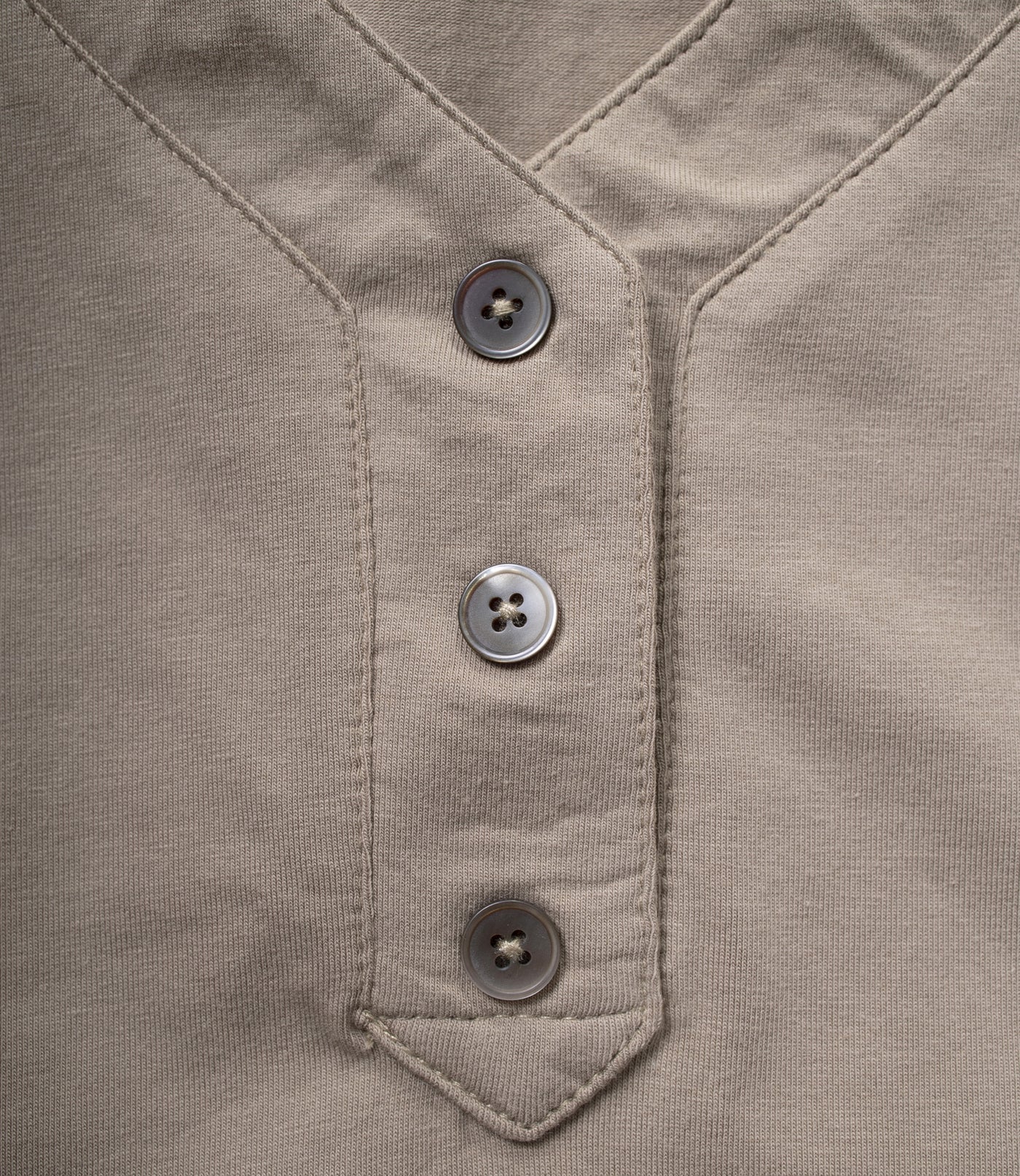Close up of buttons on JunoActive Stretch Naturals Lite 3/4 Sleeve Button Henley in Beachwood.