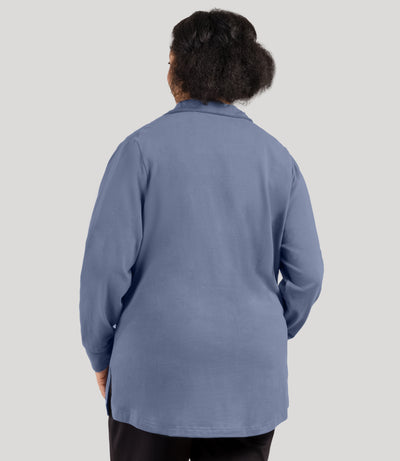 Plus size woman, facing back, wearing JunoActive's Legacy Cotton Casual Mock Neck Zip up plus size jacket in color blue steel.