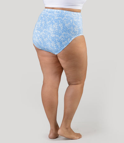 Lower half of plus size model, wearing Junowear Cotton Stretch High Waist Brief Blue Blossoms Print, facing back.