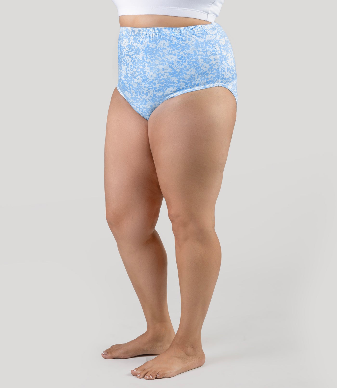 Lower half of plus size model, wearing Junowear Cotton Stretch High Waist Brief Blue Blossoms Print, facing front.