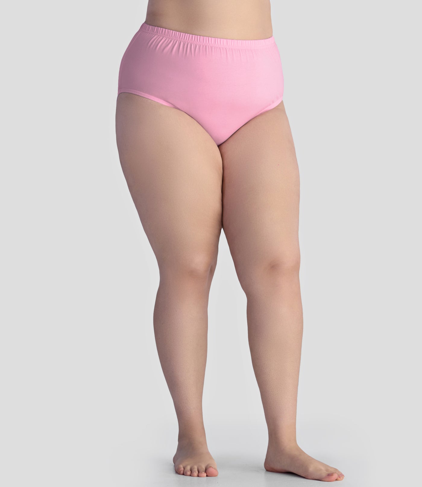 Bottom half of plus sized woman, facing front, wearing JunoActive Junowear Cotton Stretch Classic Brief in pink. This brief fits to the waistline with conservative leg opening.