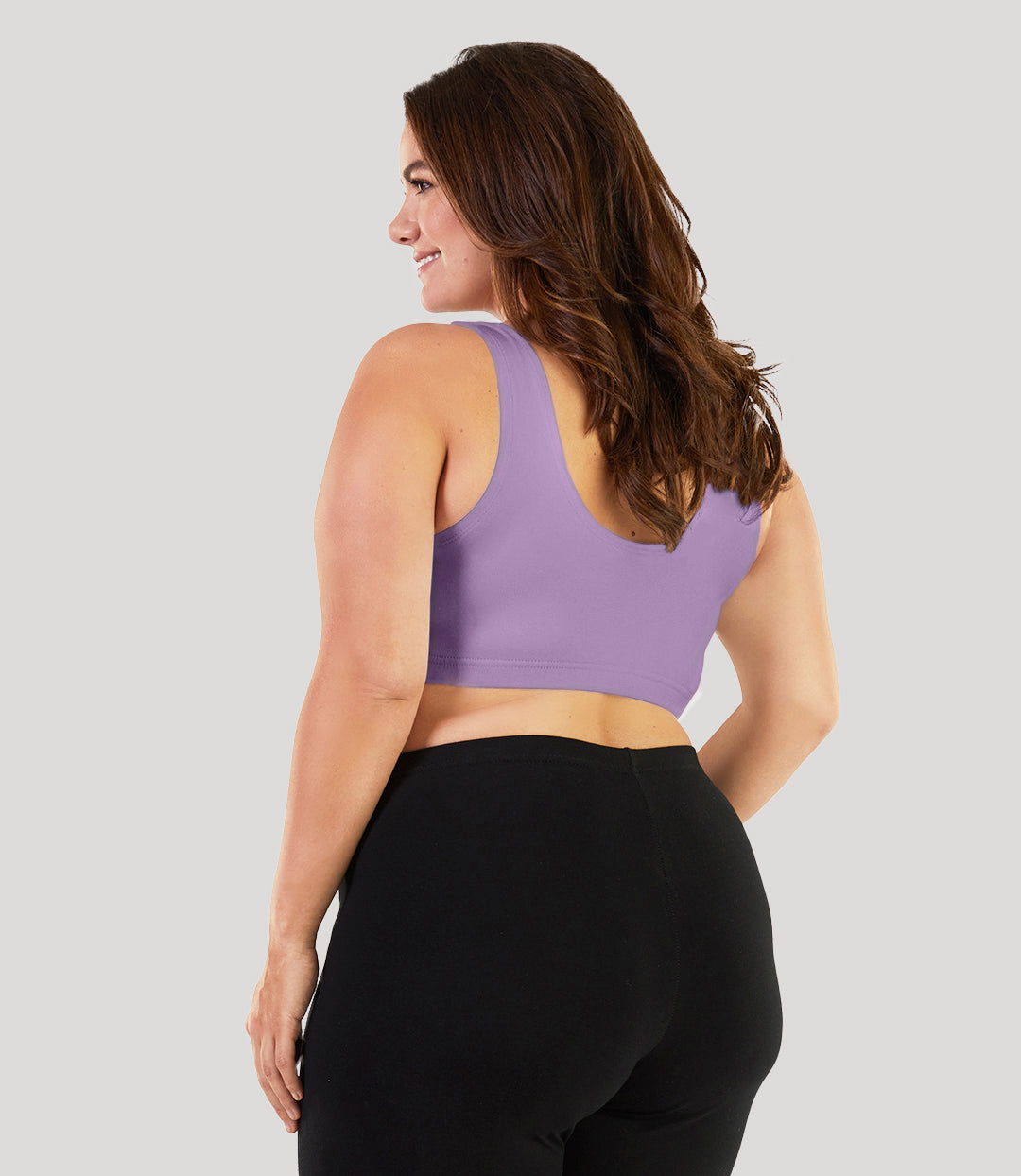 Plus size model, facing back, wearing stretch naturals Scoop Neck bra in color lavender.