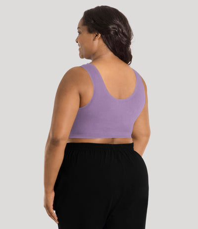 Plus size model, facing back, wearing stretch naturals full fit scoop neck bra in color lavender.