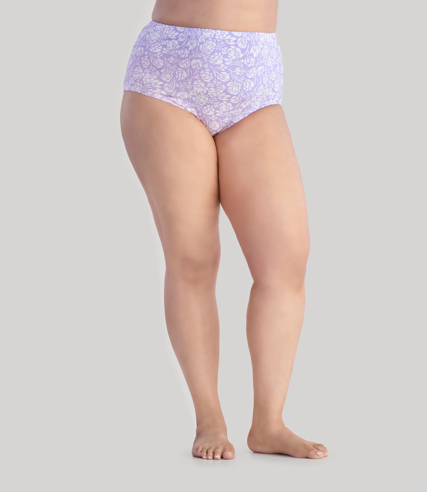 Model, facing front, wearing Junowear Cotton Stretch Classic Full Fit Brief Flower Prints in color purple and white flower. 