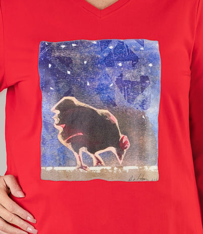 Close up of Designer Graphic Stretch Naturals Long Sleeve V-Neck Top in the color Lucky Red featuring a graphic of a rooster with a nighttime sky.