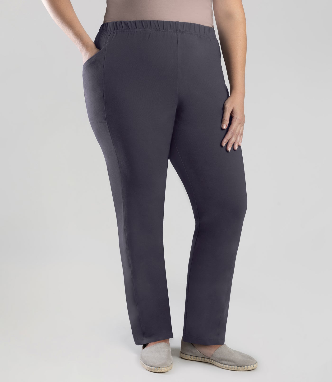 Bottom half of plus sized woman, front view, wearing JunoActive Stretch Naturals Side Pocket Loose Fit Leggings in color oak gray. Bottom hem is at the ankle.