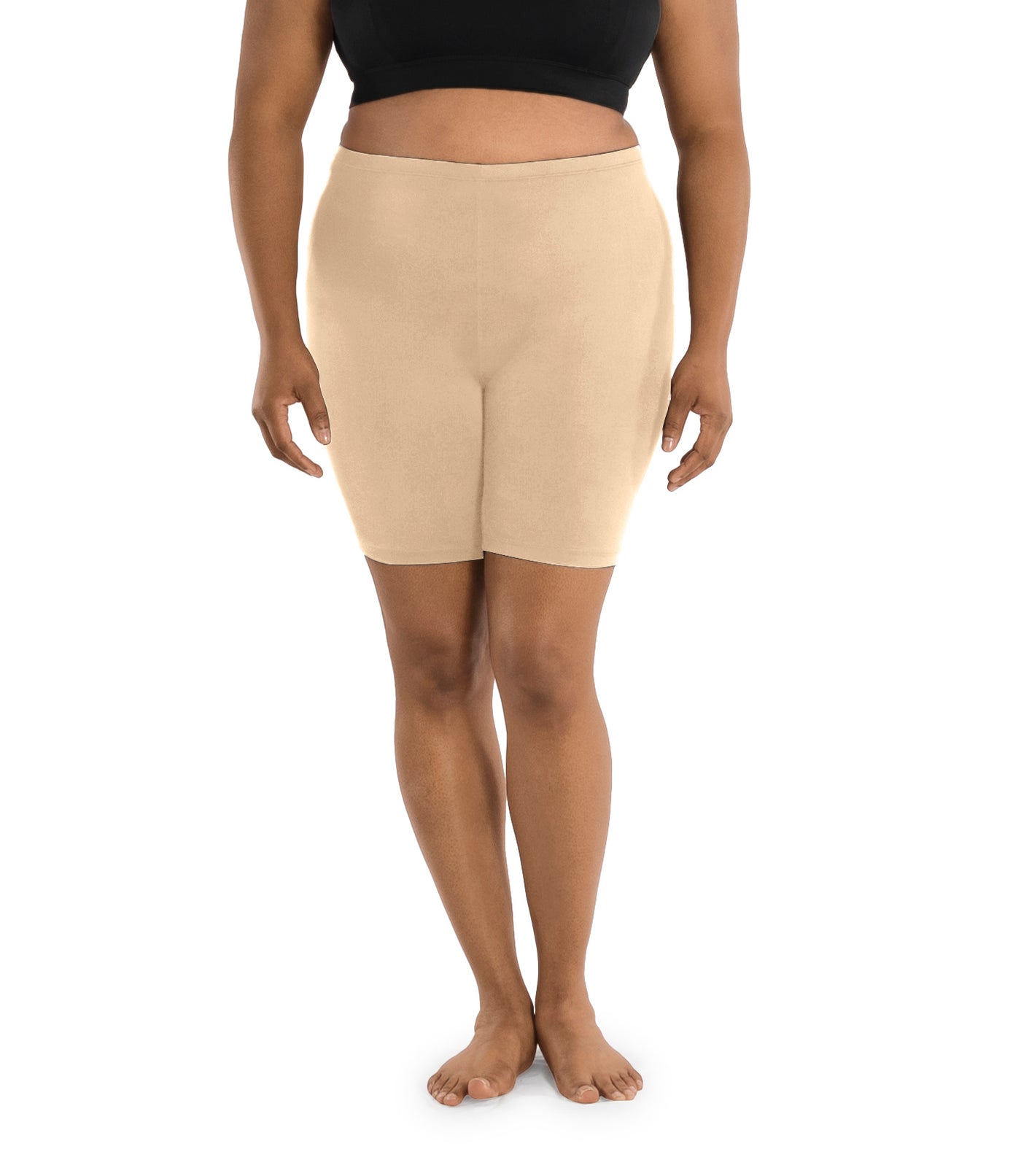 Plus size woman wearing JunoActive's hush full fit boxer in color ecru. Model is facing forward with hands to her front with hands by her side.