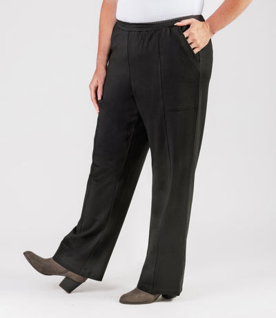 Plus size woman, facing front, wearing JunoActive's Ponte Center Seam Pocketed Pant in color black. 