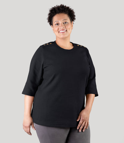 Plus size model, wearing JunoActive's JunoWaffle 3/4 Sleeve Button Top in color black.