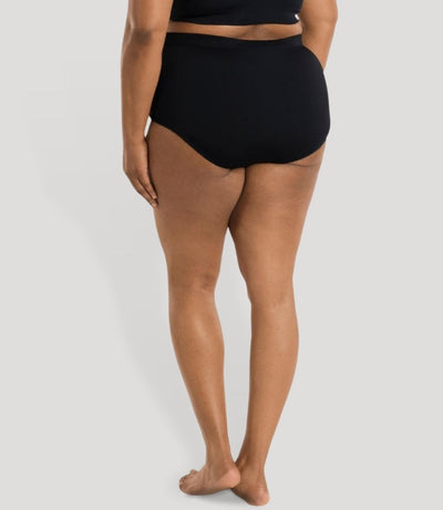 Model, facing back, wearing JunoActive's Aquasport swim brief in color black.