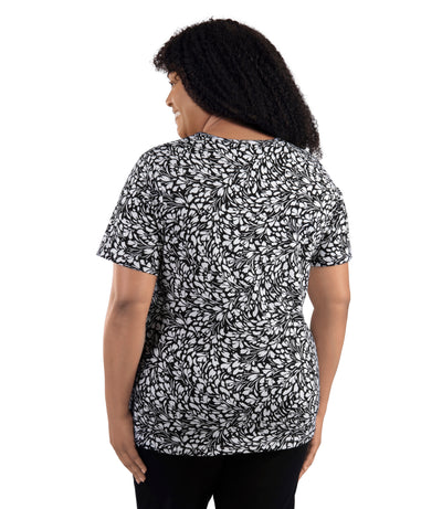 149022 Lifestyle Cotton Short Sleeve Top on plus size on model in Botanic print. Facing back.