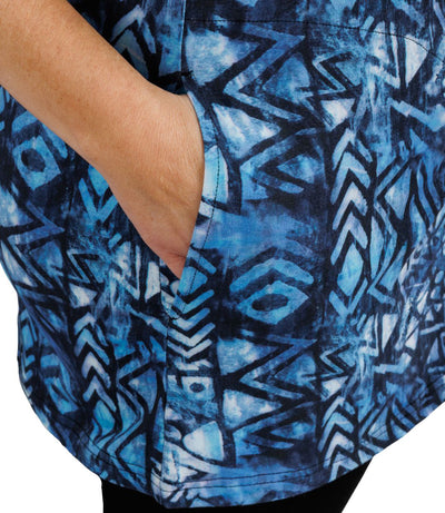 JunoActive Lifestyle Cotton three quarter sleeve pocketed tunic in print Santa Fe. Mannequin facing side with hand in pocket close up.