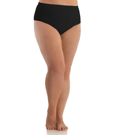 Bottom half of plus sized woman, facing front, wearing JunoActive SupraKnit Briefs in black. This brief fits to the waistline with a conservative leg opening.