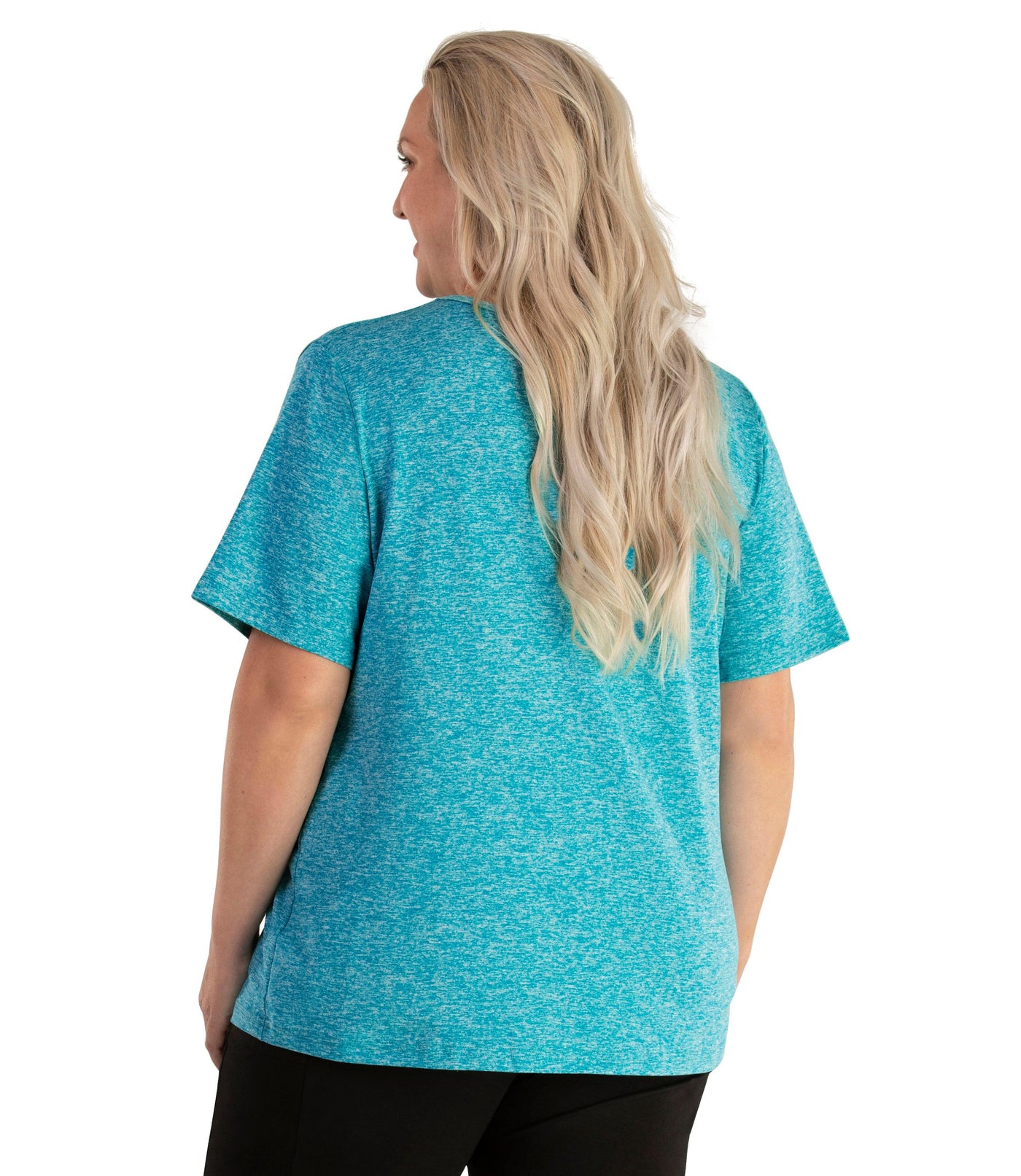 Plus size woman, facing back, wearing JunoActive plus size SoftWik V-Neck Tee in the color Ocean Blue. She is wearing JunoActive Plus Size Leggings in the color Black.