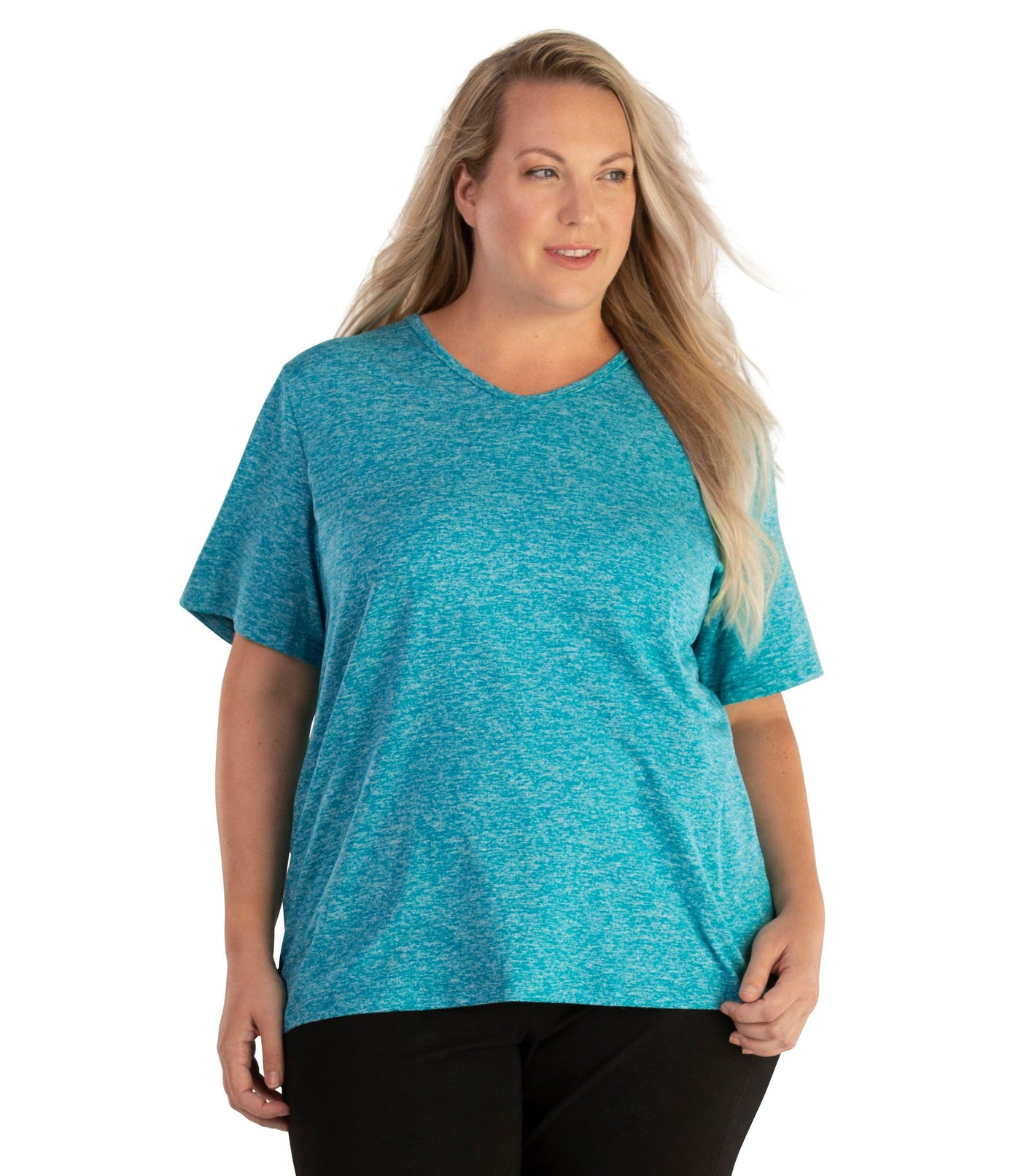 Plus size woman, facing front, wearing JunoActive plus size SoftWik V-Neck Tee in the color Ocean Blue. She is wearing JunoActive Plus Size Leggings in the color Black.