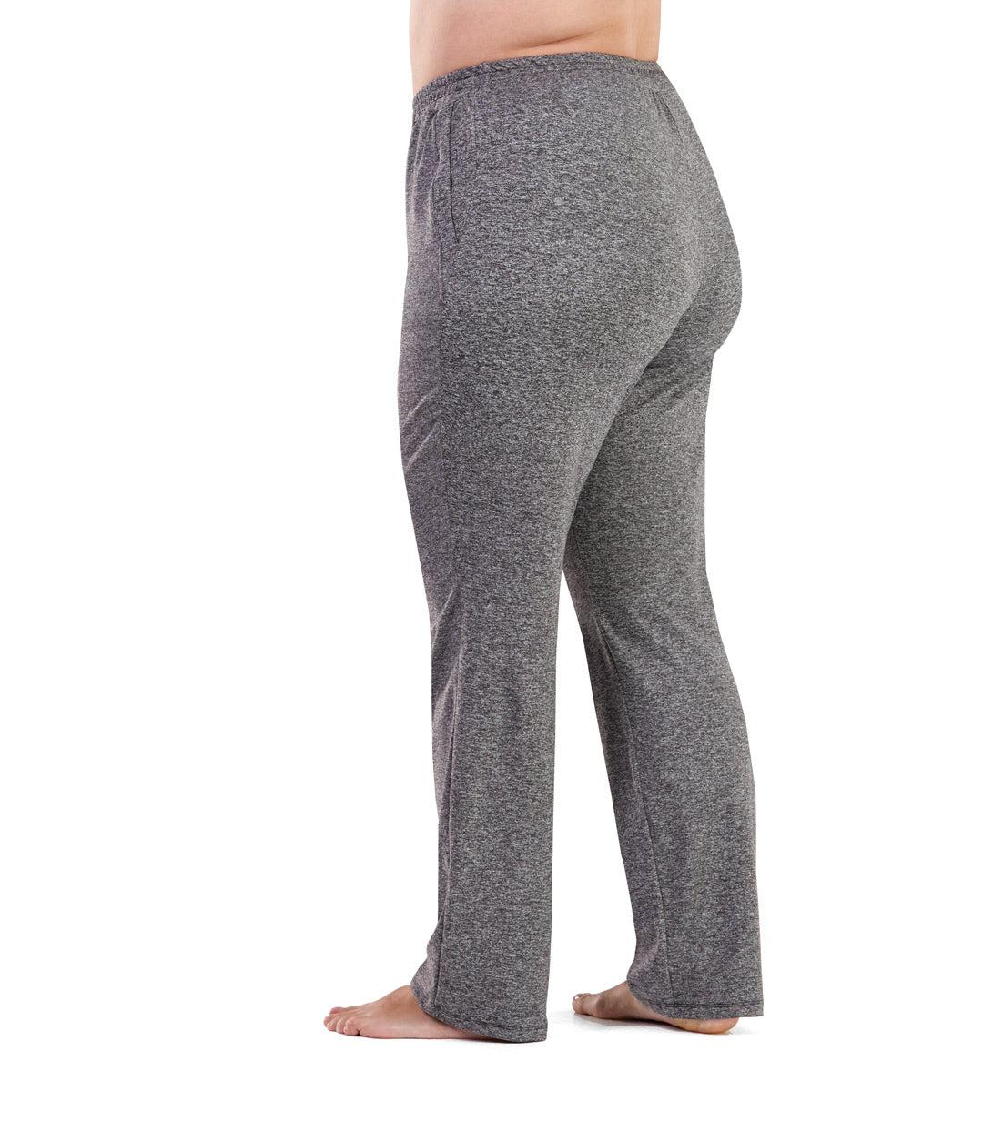 Bottom half of plus sized woman, side/back view, wearing JunoActive Softwik Pocketed Pant in color heather grey. Bottom hem is at the ankle.