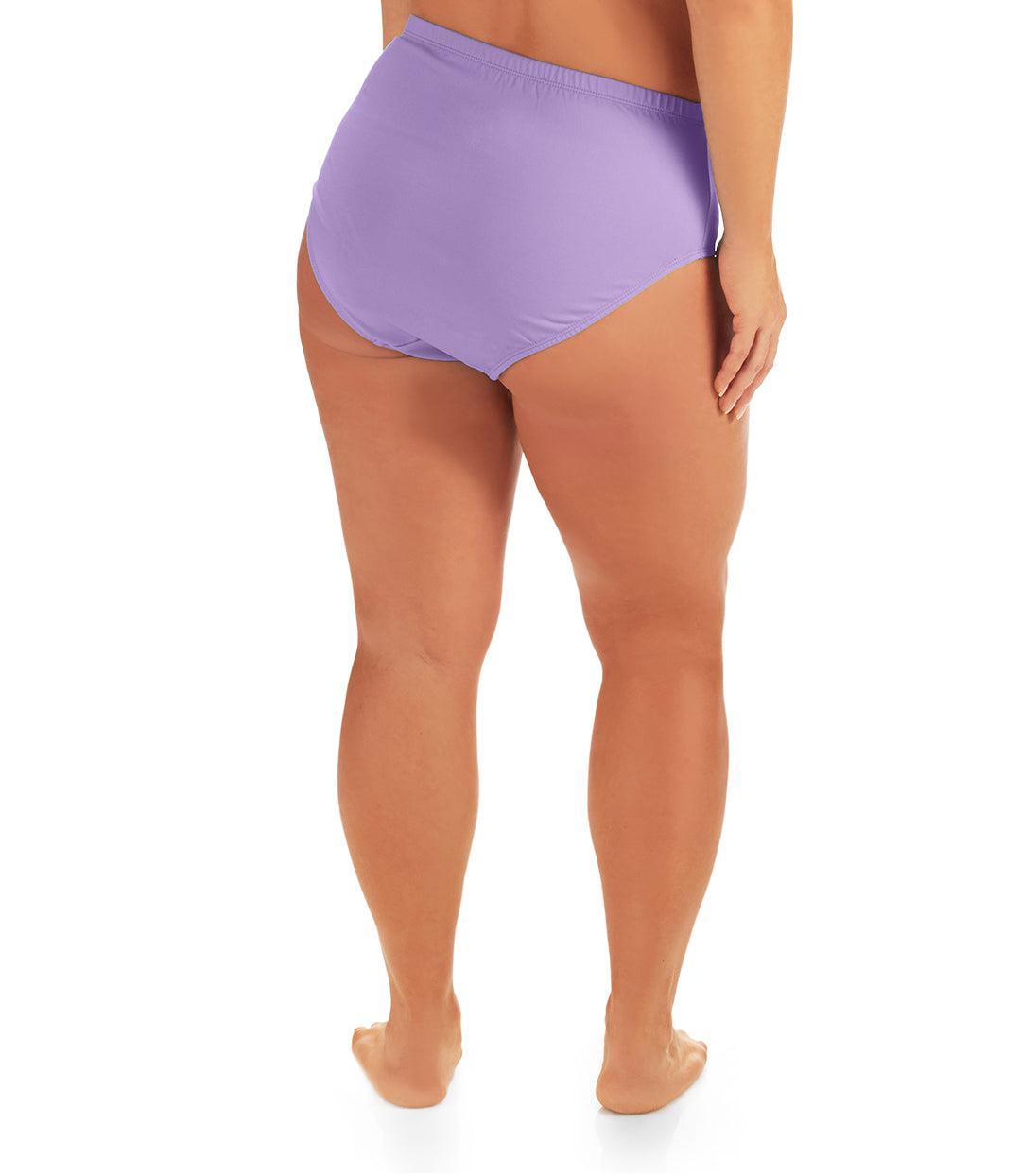 Bottom half of plus sized woman, back view, wearing JunoActive QuikWik Comfort Briefs in iris. This brief fits just below the belly button with conservative leg opening.