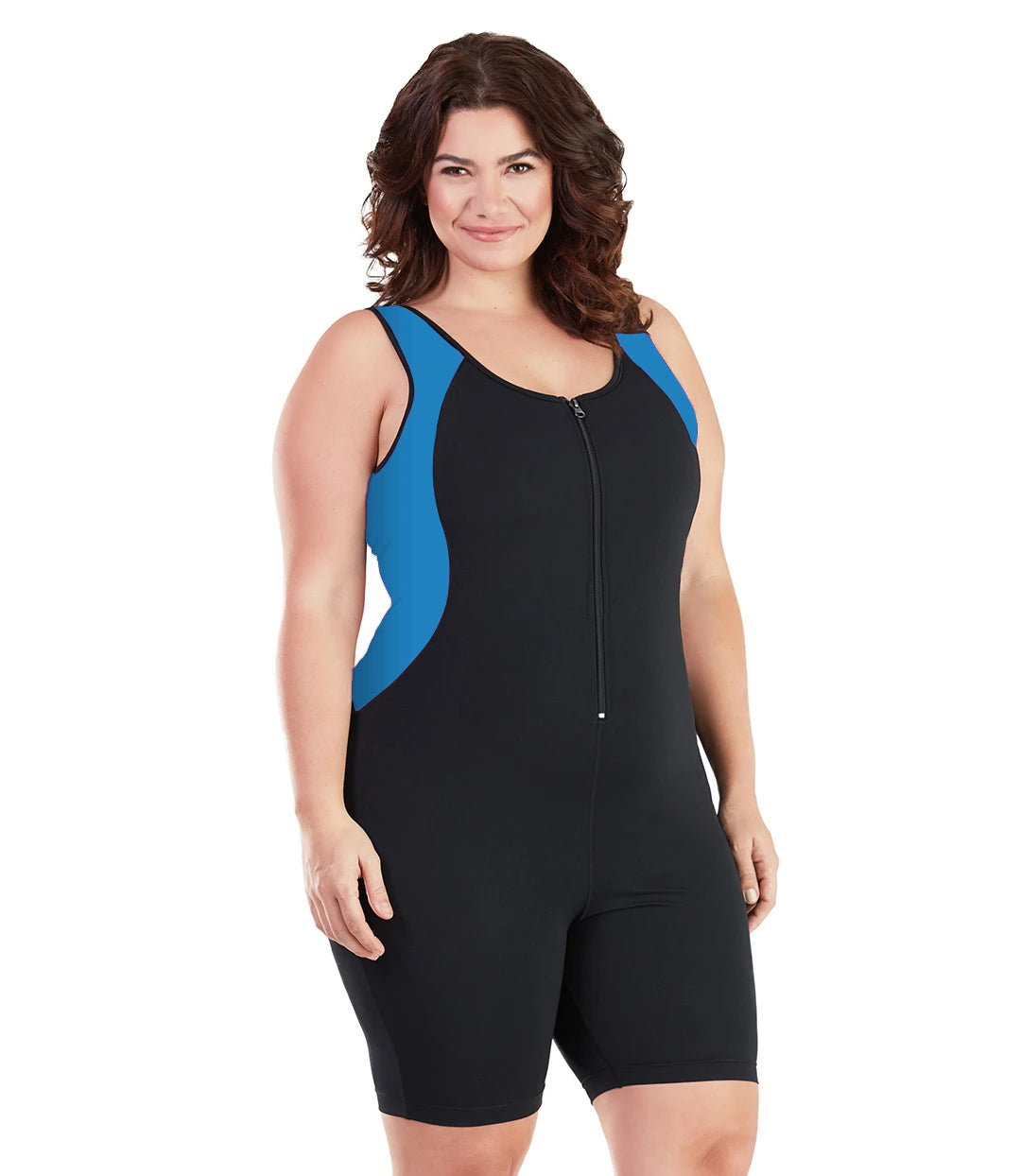 Plus size woman, facing front, wearing JunoActive plus size AquaSport Crossback Aquatard Pacific Blue Black. Front princess seam blocking is blue.  The main body of the suit is solid black, has a black zipper in front with black bindind and the neck and armholes. The leg hits a few inches above the knee.