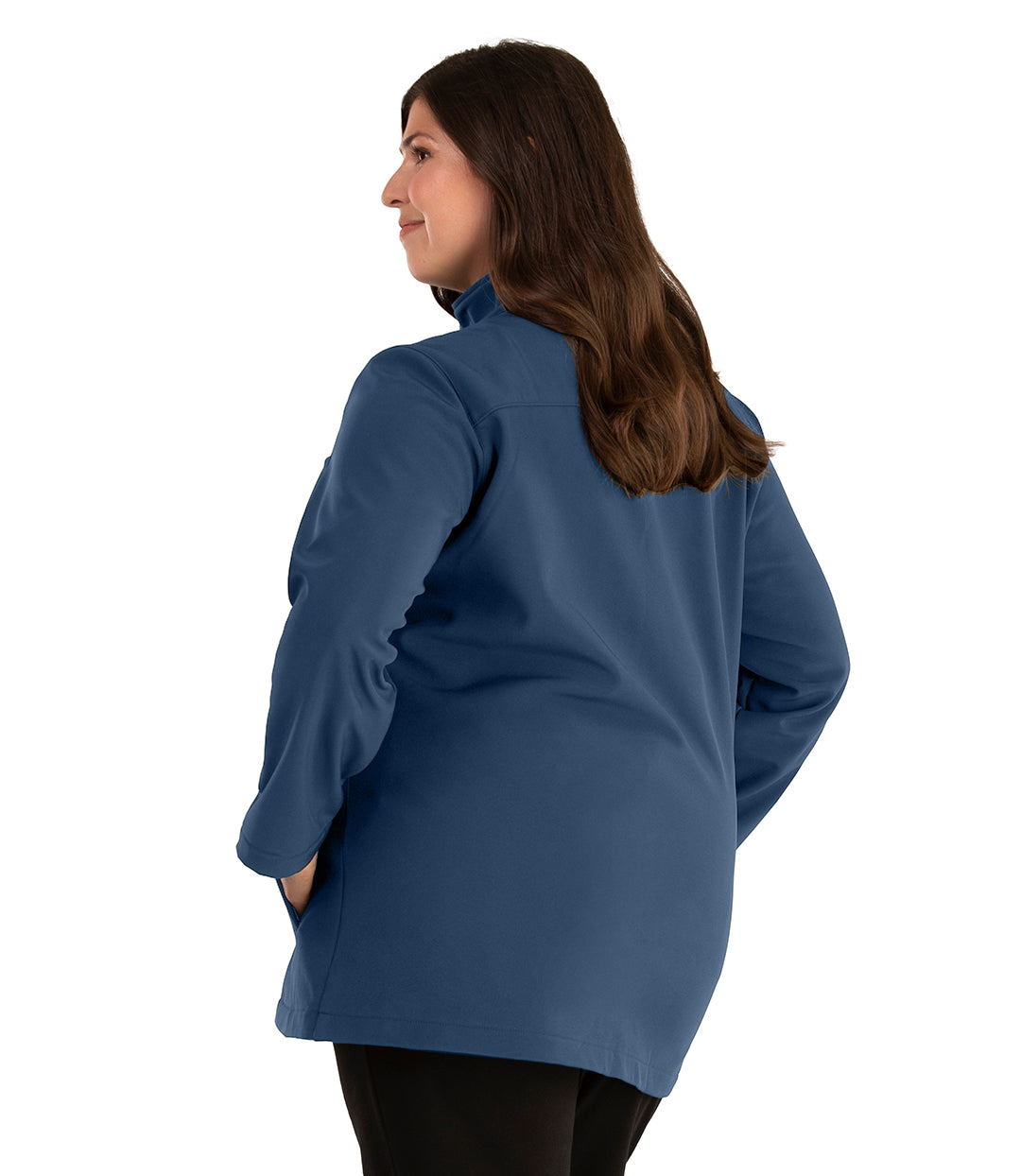 Plus size woman, back side view facing left, wearing a JunoActive plus size Mock Neck Softshell Jacket in Tiempo Teal. The jacket has a mock neck collar, zip front closure, and side pockets. The length of the plus size jacket hits just below the hips.