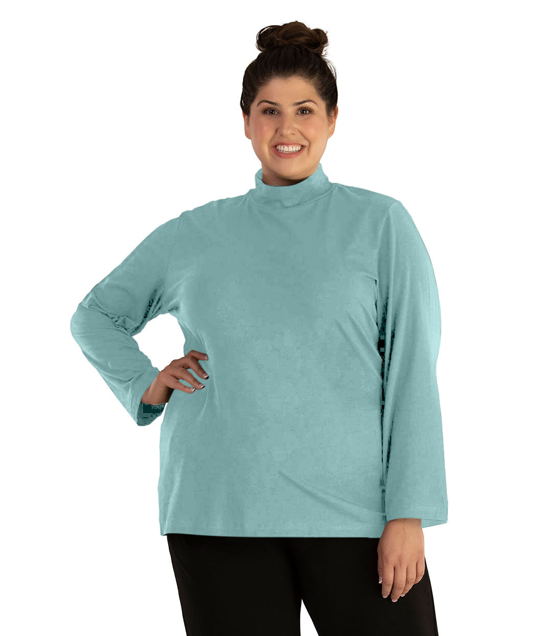 Plus size woman, facing front, wearing JunoActive plus size Stretch Naturals Lite Mock Neck Top in the color Robin Blue. She is wearing JunoActive Plus Size Leggings in the color Black.