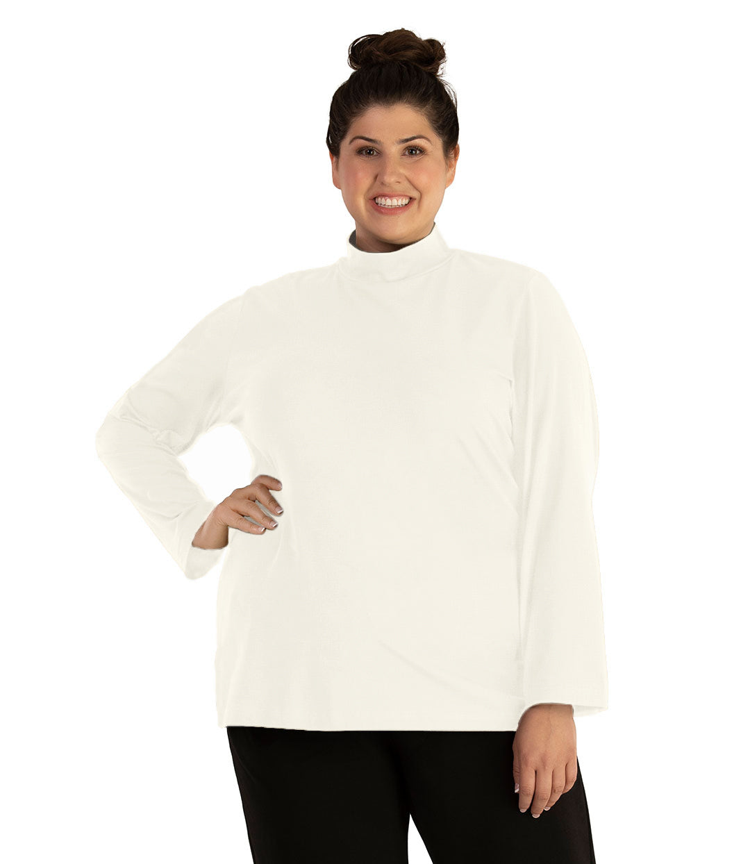 Plus size woman, facing front, wearing JunoActive plus size Stretch Naturals Lite Mock Neck Top in the color Winter White. She is wearing JunoActive Plus Size Leggings in the color Black.