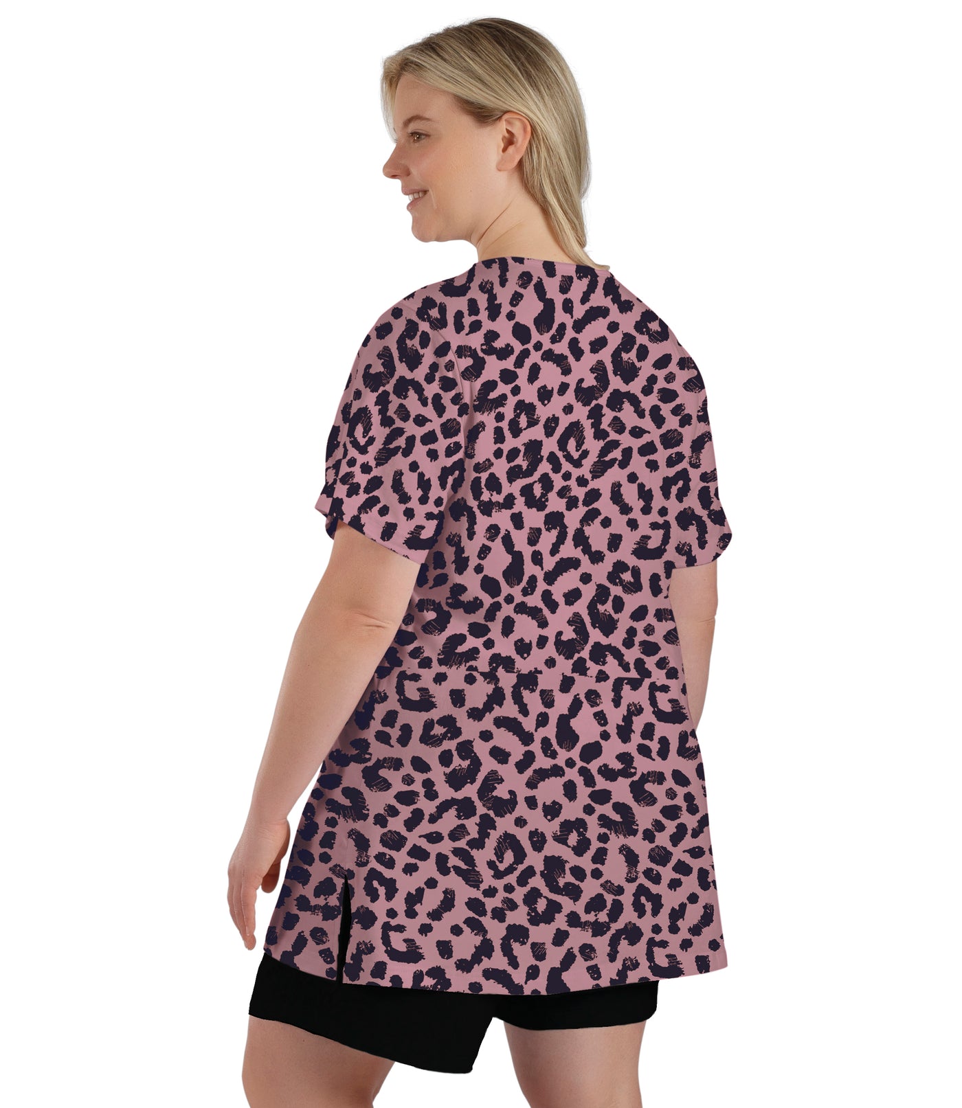 Plus size woman, facing back, wearing JunoBliss V-Neck Short Sleeve Top in leopard black print &  rose color tee. The length comes past crotch and is loosely fitted. Split in side hem. 