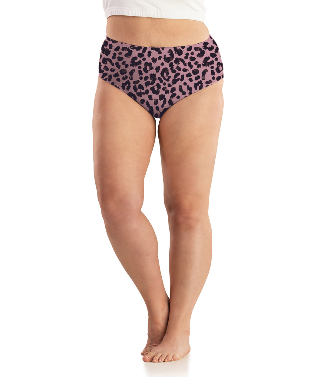 Plus size woman, facing front, wearing JunoActive’s  Junowear cotton stretch classic brief in color jungle rose print. 