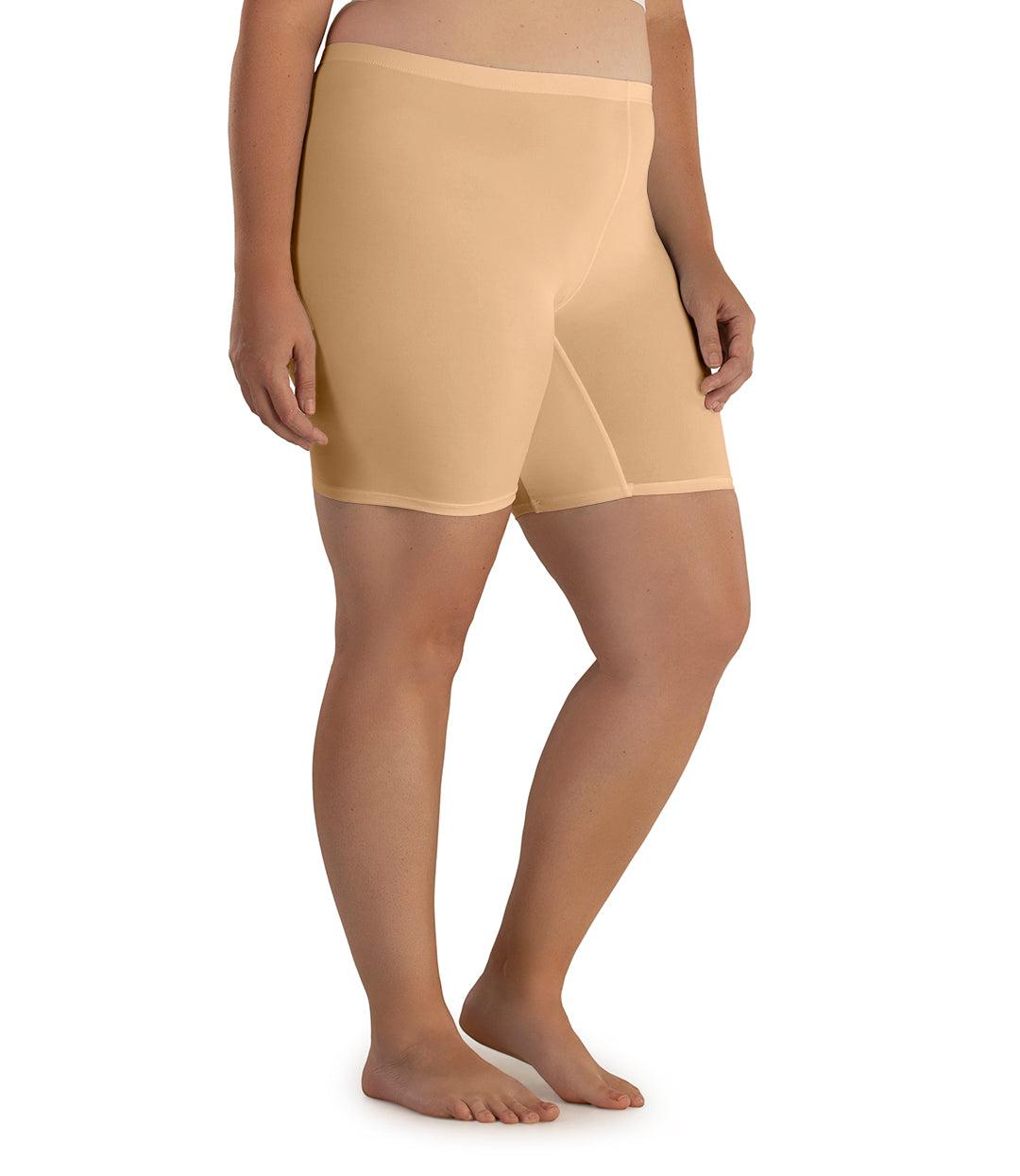 Plus size woman, side front view, wearing JunoActive Junowear Cotton Stretch Fitted Boxer. The hemline is a few inches above knee in color taupe.