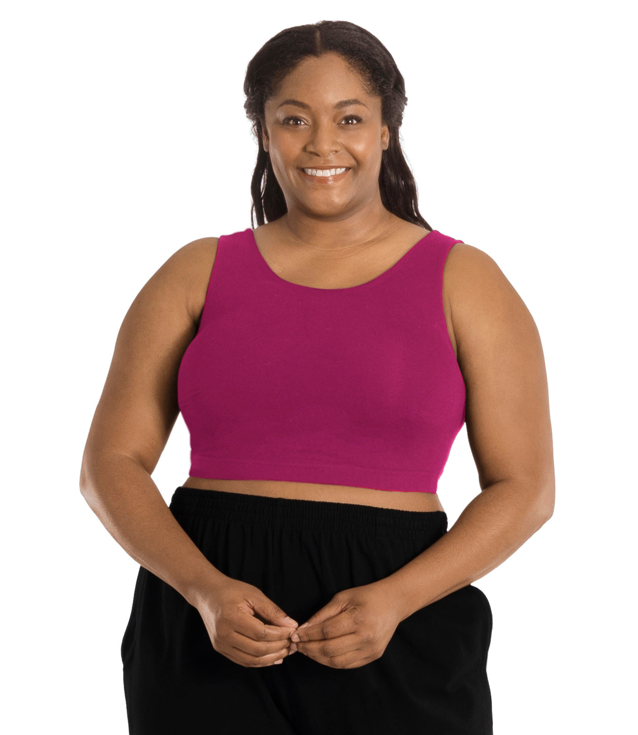 Plus size woman, facing front, wearing JunoActive plus size Stretch Naturals Scoop Neck Bra in Merlot. The woman is wearing black JunoActive plus size bottoms. Her arms fall naturally to her side.