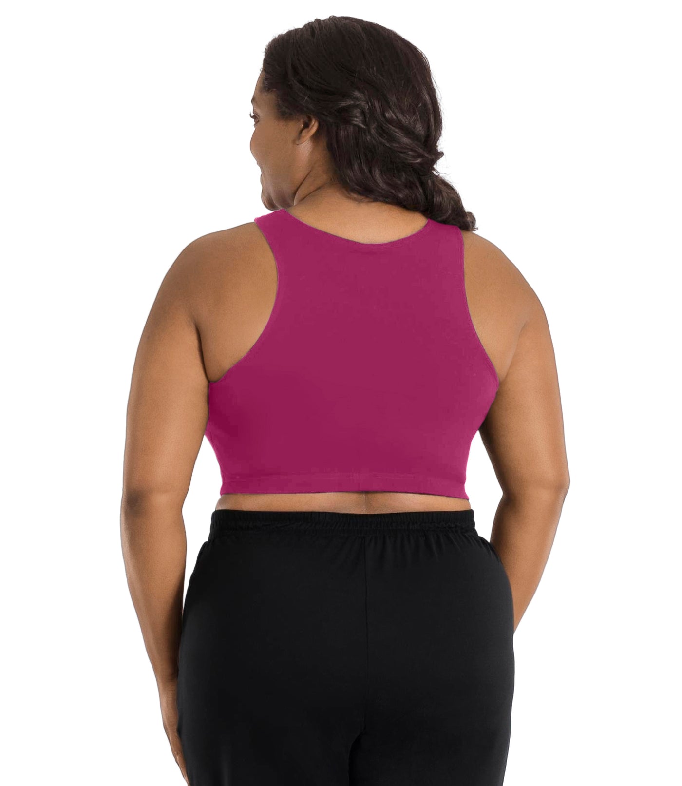 A plus size woman, facing back, wearing a merlot colored JunoActive Stretch naturals full fit plus size bra. Featuring a v-neck and side bust darts for a full fit. She is also wearing black JunoActive plus size pants.