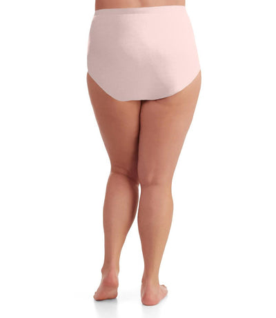 Bottom half of plus sized woman, back view, wearing JunoActive Junowear Cotton Stretch Classic Full Fit Brief in light pink. This brief has a high waist fit with conservative leg opening.
