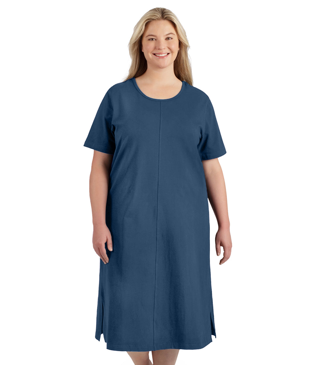 Plus size woman, facing to the front, wearing JunoActive plus size Stretch Naturals Short Sleeve Dress in the color denim blue.
