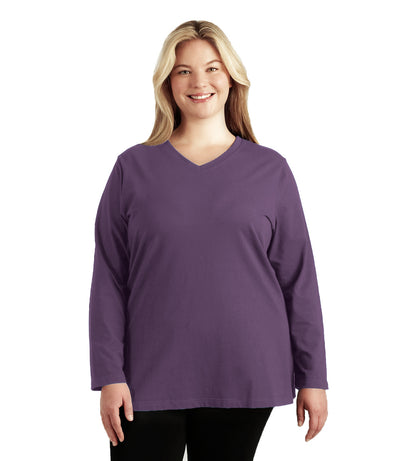 Plus size woman, facing front, wearing JunoActive plus size Stretch Naturals Long Sleeve V-Neck Top in the color Black Berry. She is wearing JunoActive Plus Size Leggings in the color Black.